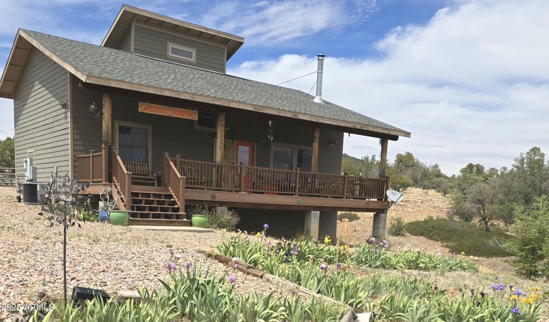 Irises Blooming in Front of Res