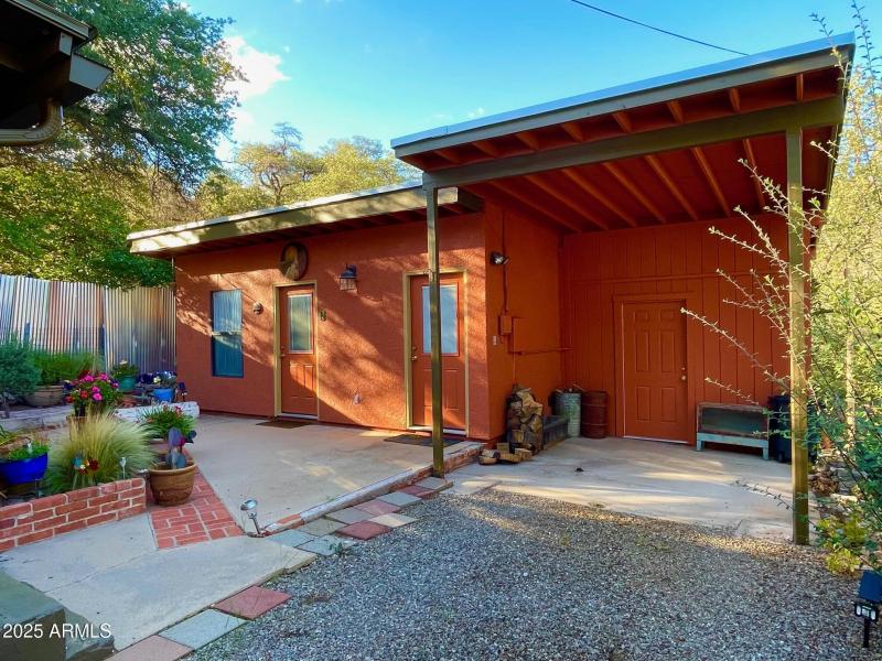 Carport and storage closet at back