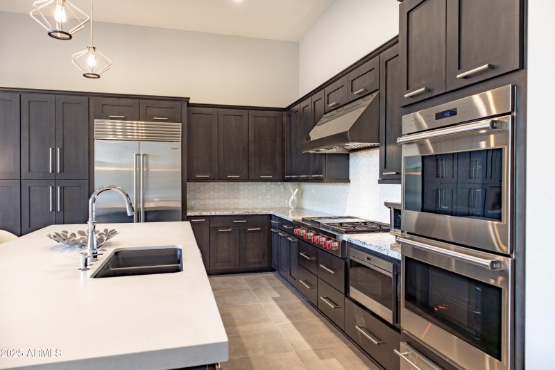 Kitchen two ovens, microwave, stovetop