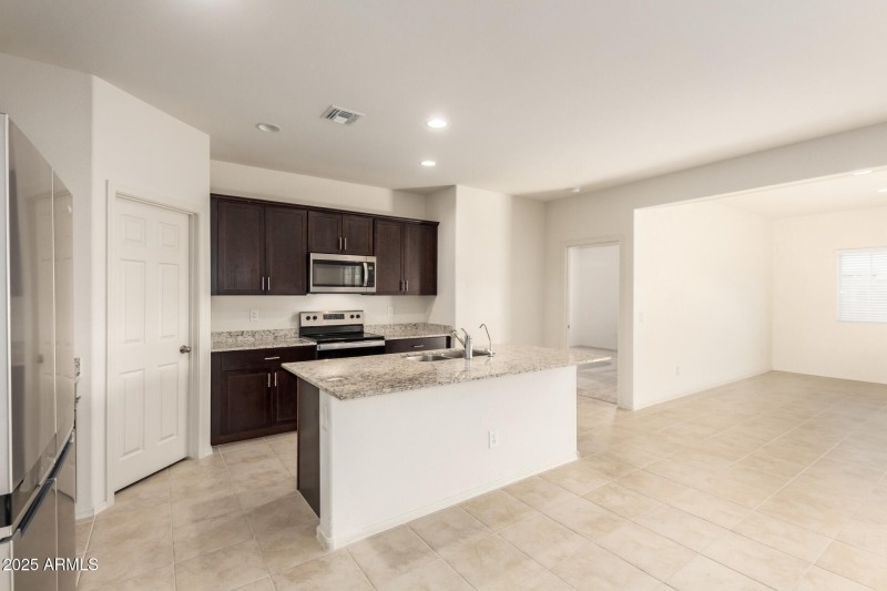 KITCHEN OPEN TO HUGE DINING RM