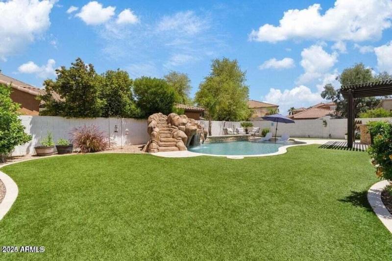 Backyard with large turf area