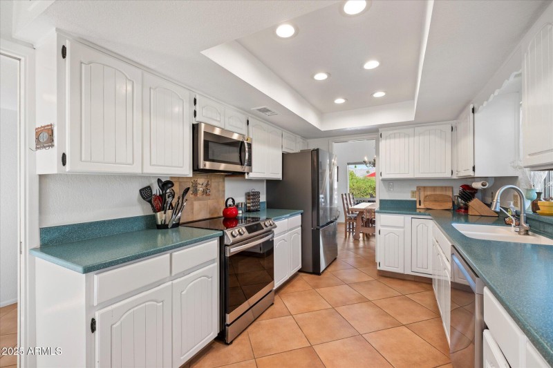 Kitchen with stainless steel appliances