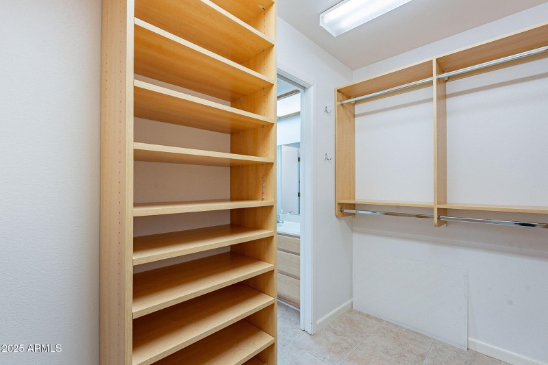 Primary Closet with Organization Shelves