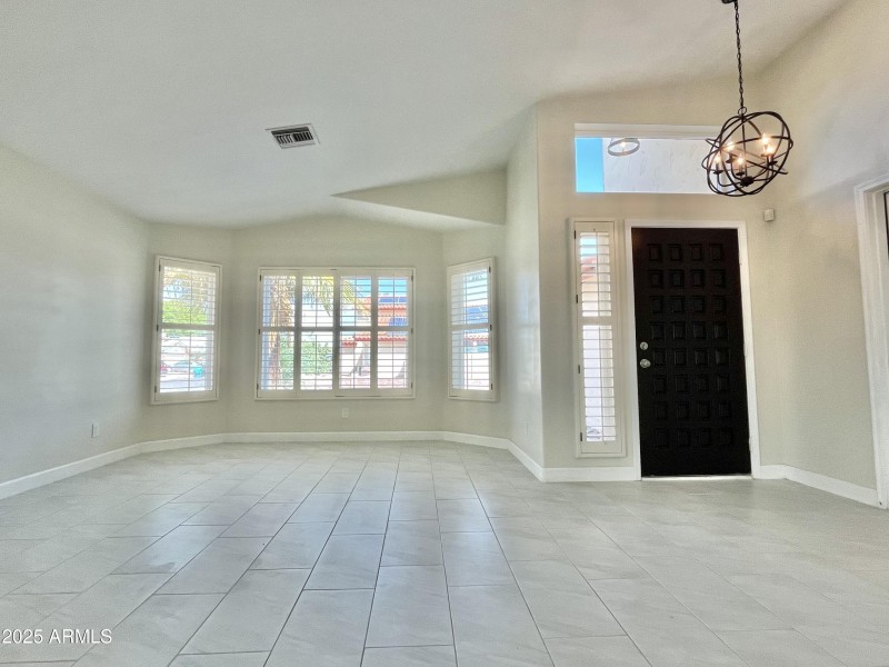 Living Room bay window, wood shutters