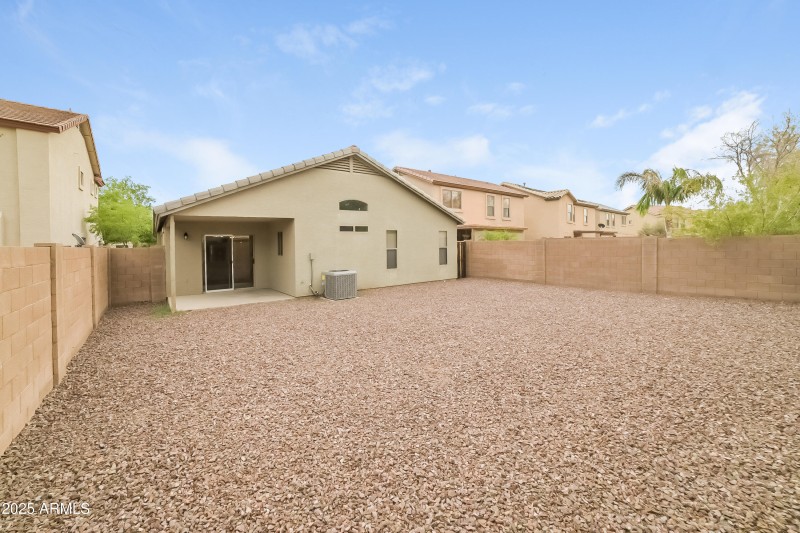 1012394.8410 S 49TH LN - Rear View