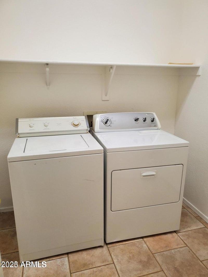 Washer and Dryer laundry room inside