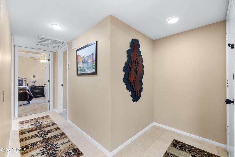 Foyer entry & hallway to 2 bedrooms & Ba