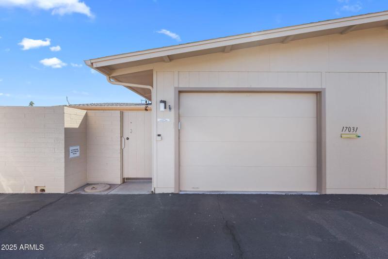 Garage and gated entry to Private Patio