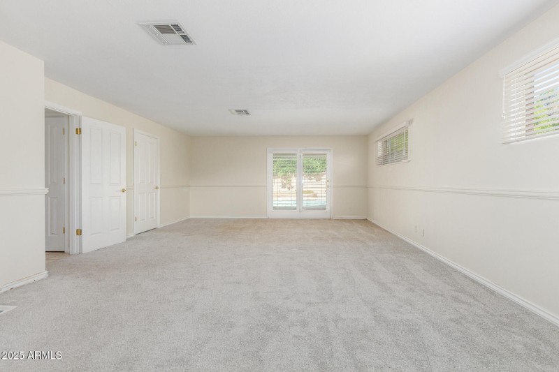 Primary with walk-out to pool