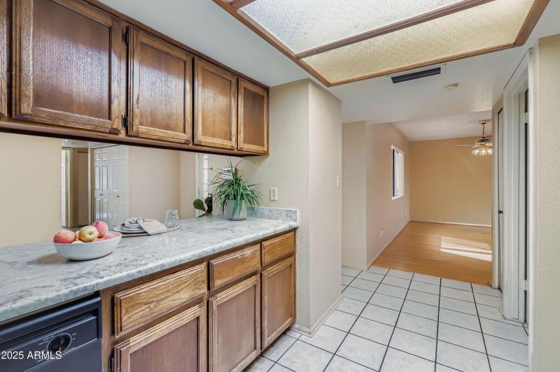 Kitchen with view into living room