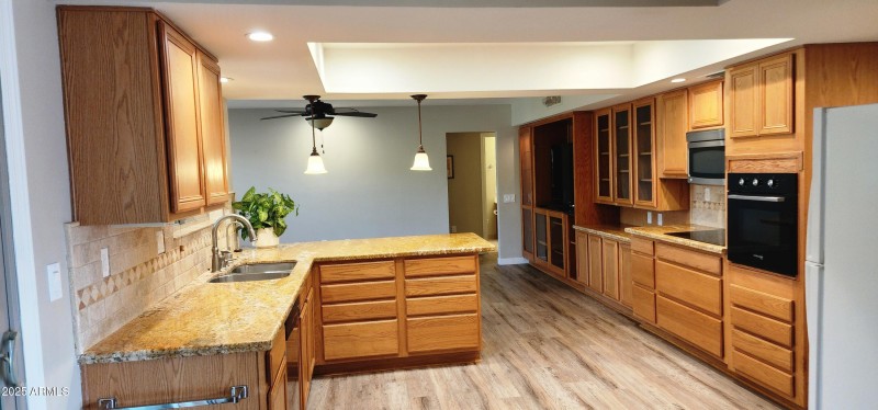 KITCHEN WITH GRANITE COUNTER TOPS