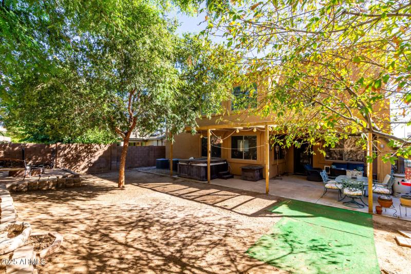 Shaded Backyard with Covered Patio