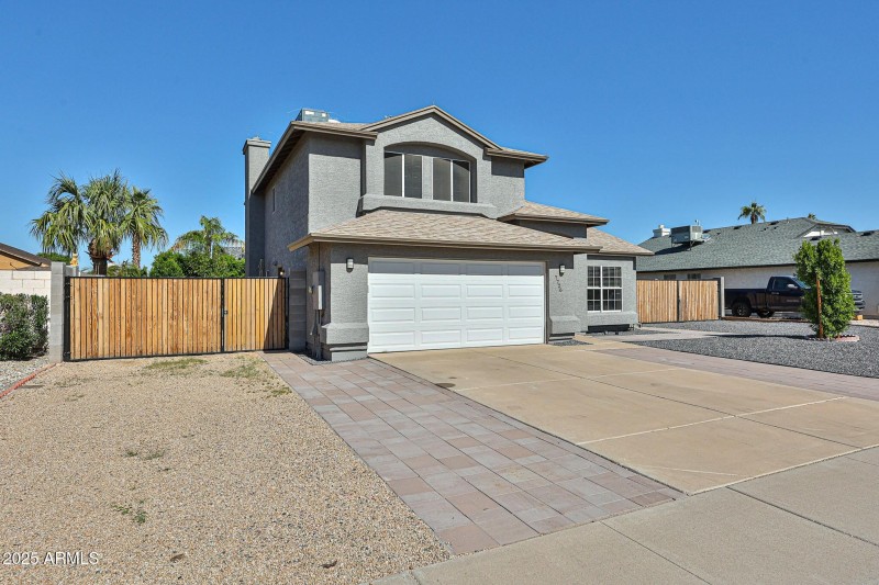 FRONT WITH TWO RV GATES AND A SINGLE GAT