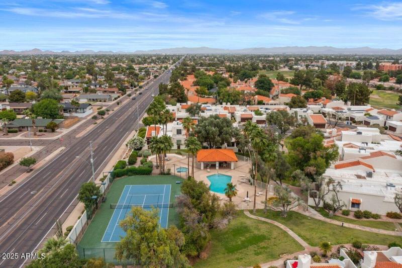 Aerial community pool and tennis 3