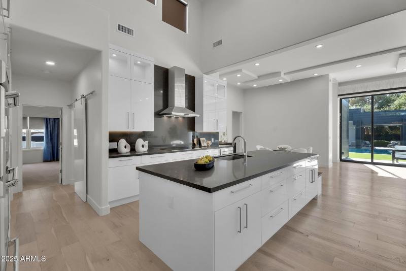 Kitchen overlooking backyard