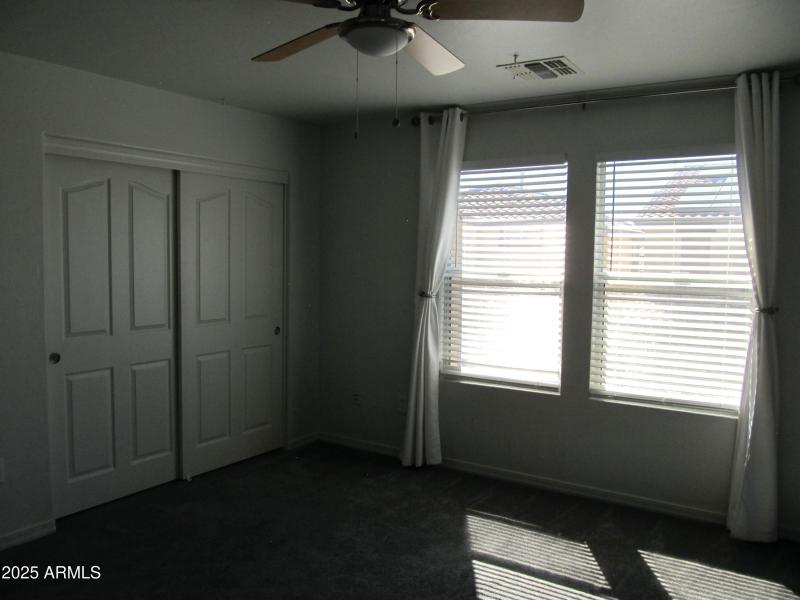 Primary bedroom (dual closets!)