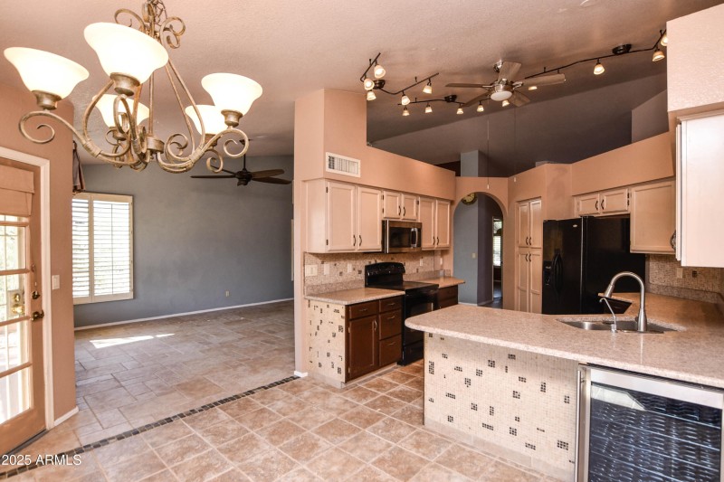 LIVING ROOM, DINING AREA, & KITCHEN