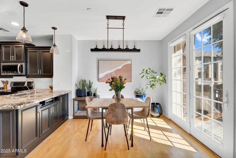 Bright Dining Area with Balcony