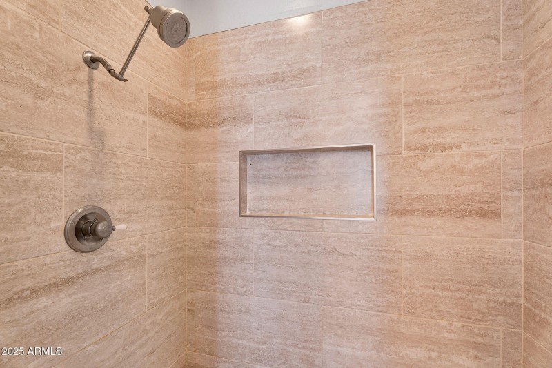 Sleek Tiled Shower with Niche