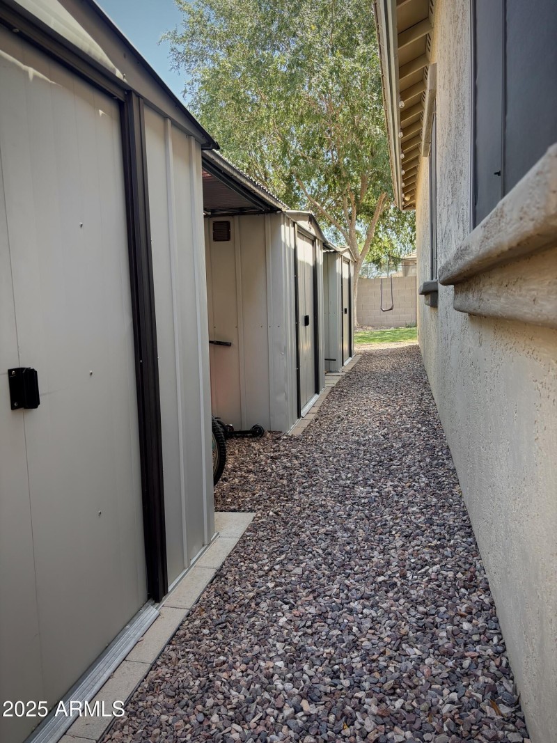 3 Sheds & 2 Covered Storage Areas