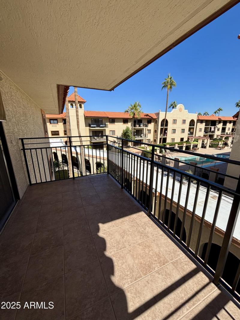 Shaded patio with window shade