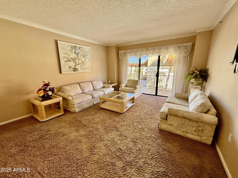Living room with pool view