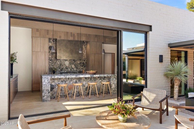 Sliders open to outdoor seating area