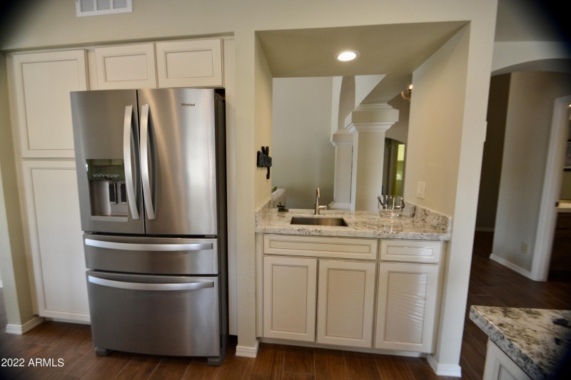 Kitchen w/ Wet Bar & Pantry