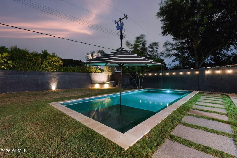 Back yard with custom lighting