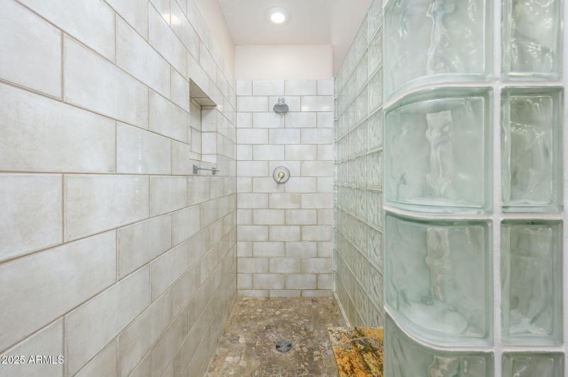 Gorgeous Tile With River Rock Floor!