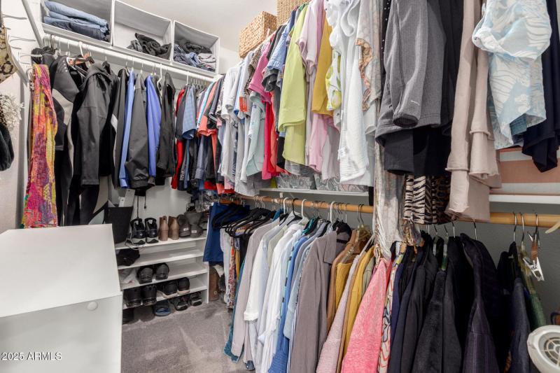 24 Primary Walk-in Closet