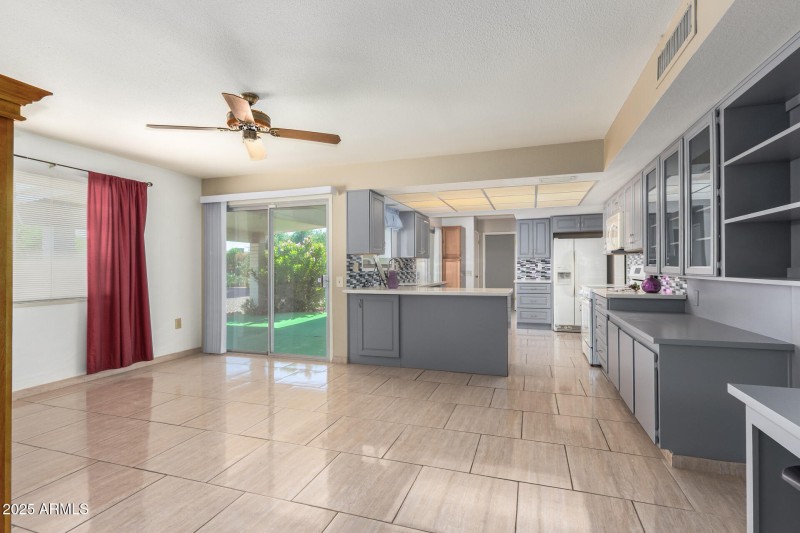 Two sliders, open kitchen to family room