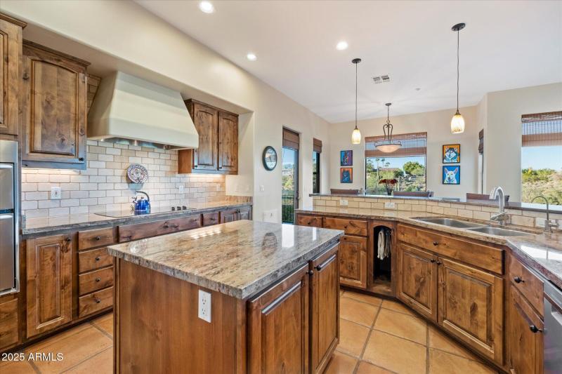 Custom Cabinetry + Travertine Backsplash