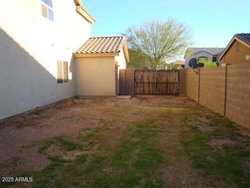 Photo of side yard when empty