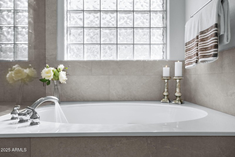 Soaking tub in Master Bath with Glass Bl