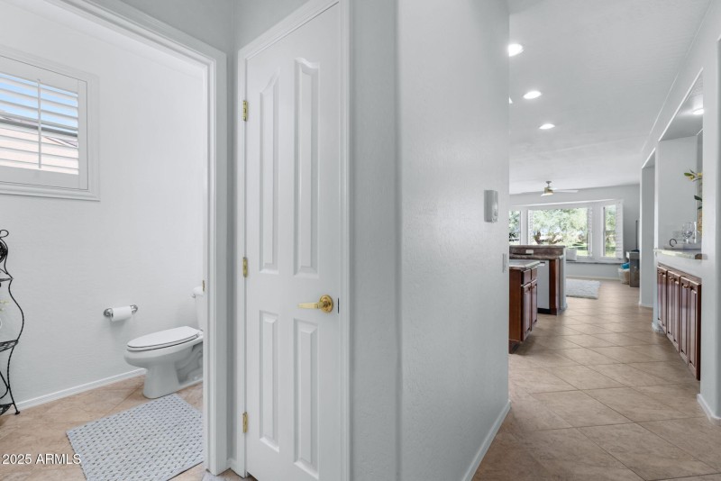 Powder Bath off Kitchen & Hall Closet