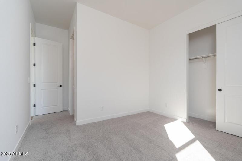 Tri Pointe Soleo 242 - Bedroom 2-1MLS