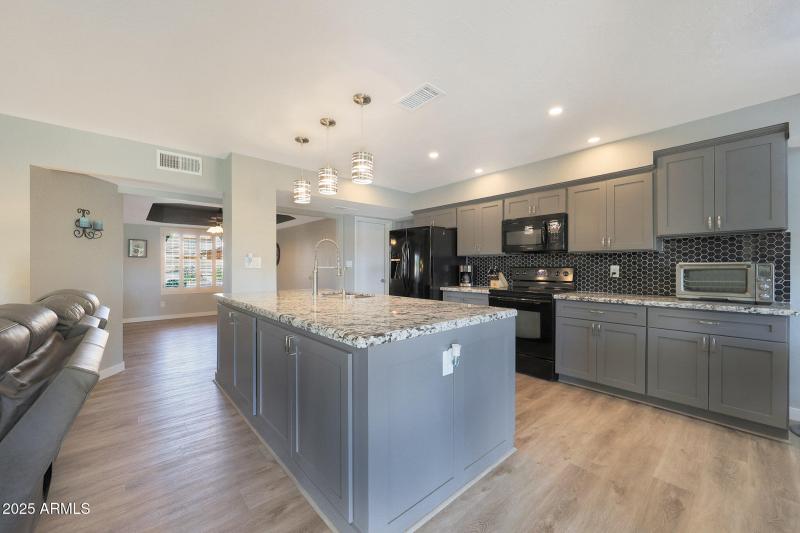 Granite counters and custom cabinets