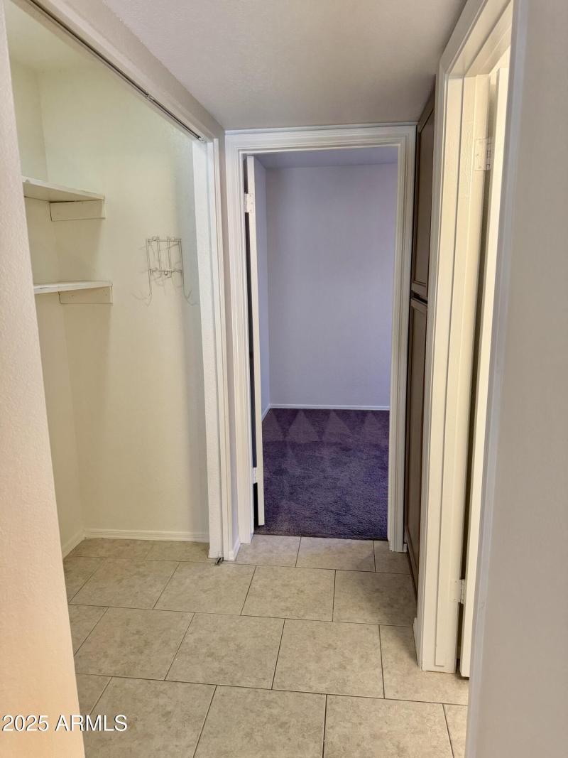 Hall to secondary bed bath and laundry