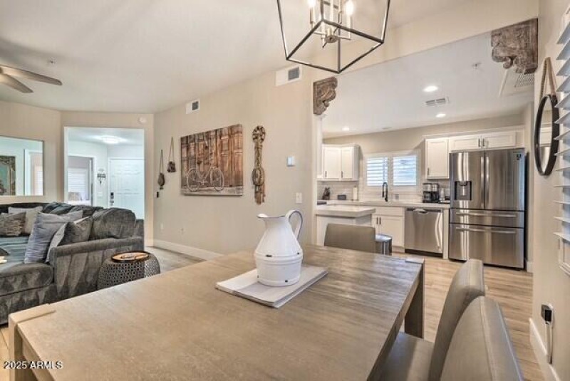 Lisa Condo great room table and kitchen