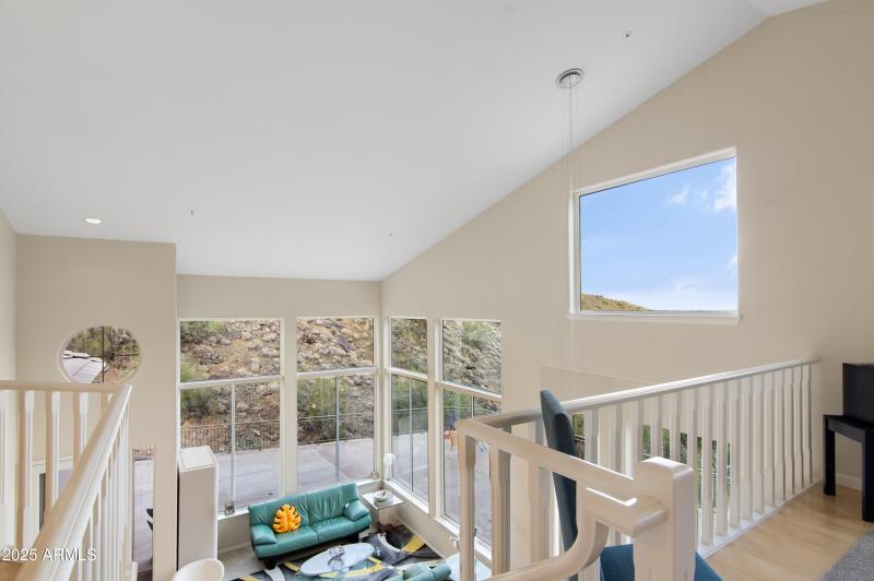 Loft Overlooks Family Room Space