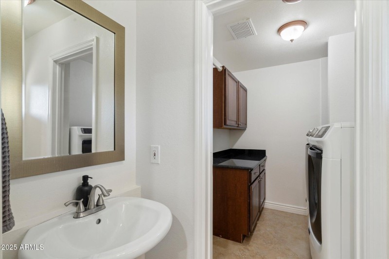 Convenient ½ Bath and Laundry