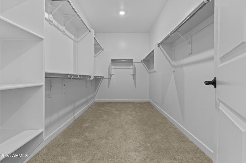 Expansive Primary Walk-In Closet