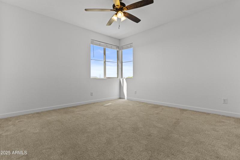 Sunlit Corner Bedroom