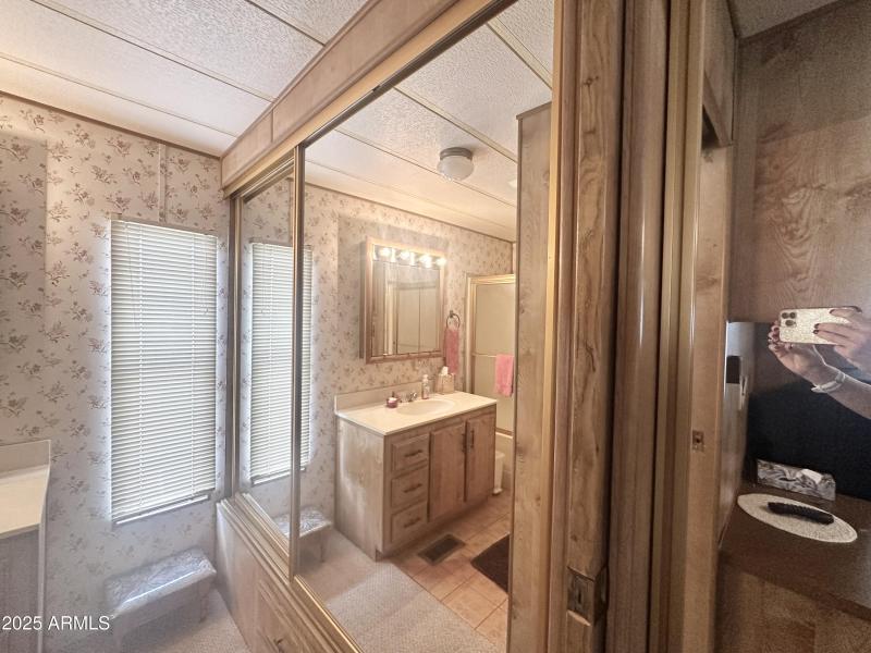 MIRRORED CLOSET IN BEDROOM