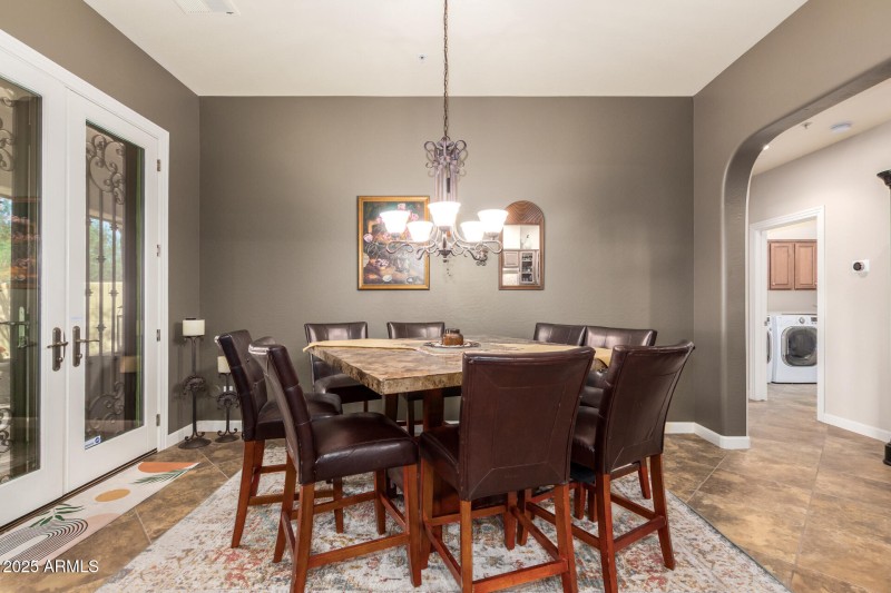 FORMAL DINING WITH FRENCH DOOR EXIT TO P