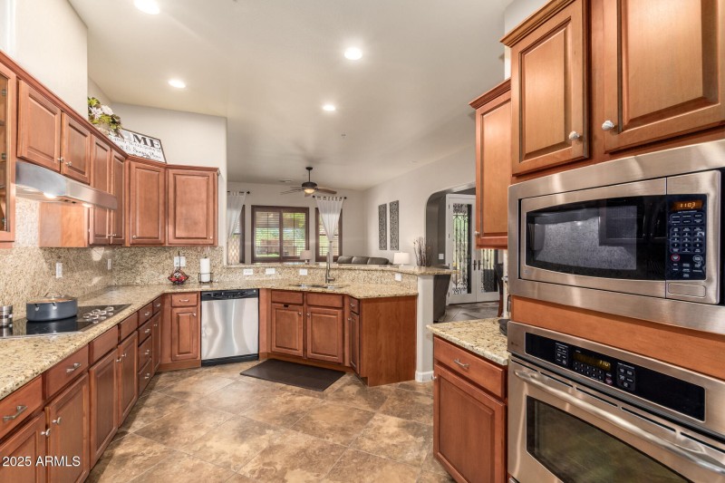 GOURMET KITCHEN WITH WALL OVENS & RICH C