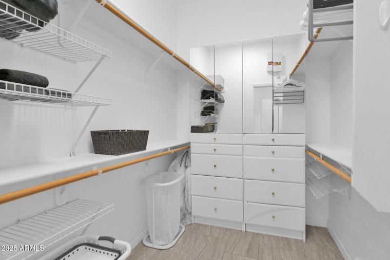 18-Primary Bedroom walk-in closet