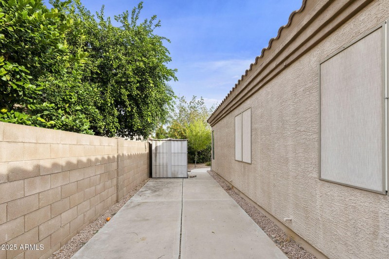 slab parking on garage side of home