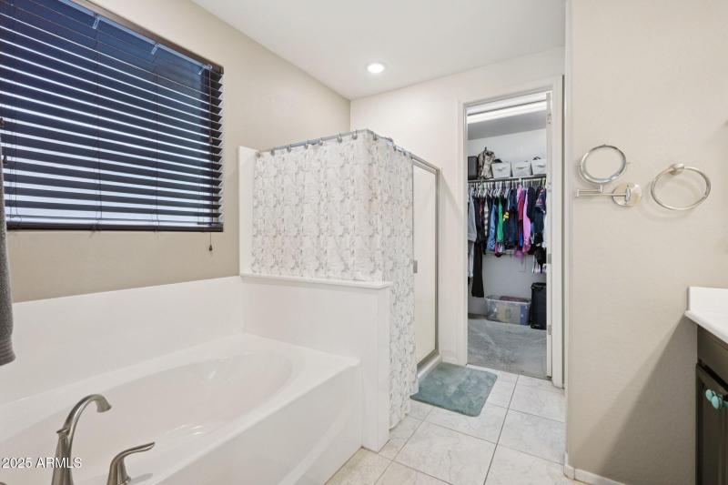 Primary Bathroom with walk in closet